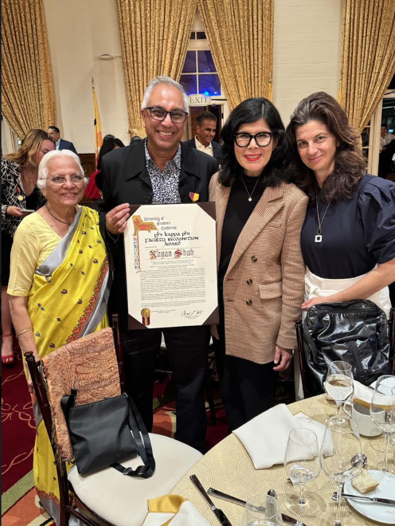 Nayan Shah with his mother, Devyani Shah and colleagues, Natalia Molina and Sarah Gualtieri at the USC Honors Convocation, April 2024.